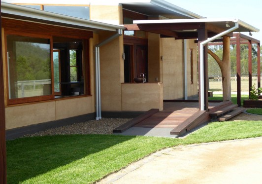 entry ramp to rammed earth home