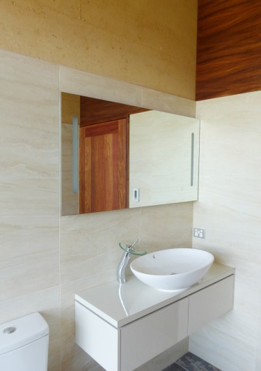 Tiles used on rammed earth wall